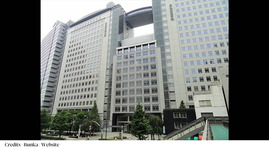 A tall building with many windows

Description automatically generated