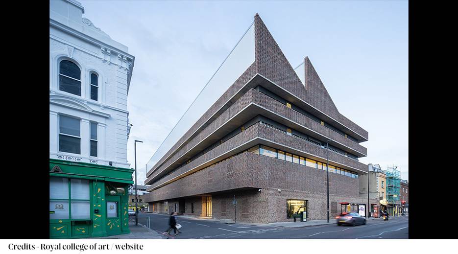 A building with triangular shaped windows

Description automatically generated